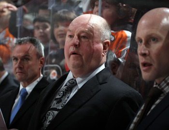 PHILADELPHIA, PA - JANUARY 18: Head coach Bruce Boudreau of the Washington Capitals watches practice prior to the game against the Philadelphia Flyers at the Wells Fargo Center on January 18, 2011 in Philadelphia, Pennsylvania.  (Photo by Bruce Bennett/Ge