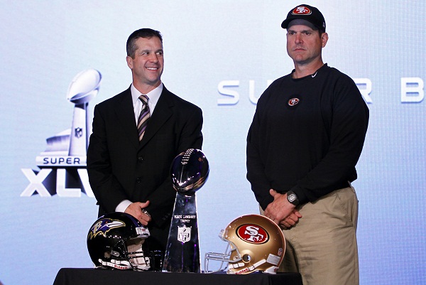 San Francisco 49ers head coach Jim and his brother, Baltimore Ravens head coach John Harbaugh, appear during their joint press conference ahead of the NFL's Super Bowl XLVII in New Orleans